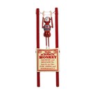 Singe acrobatique en bois