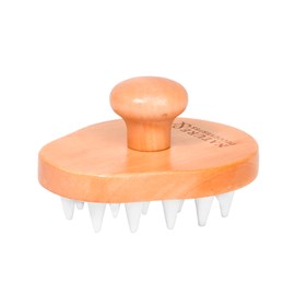 Brosse stimulante cuir chevelu