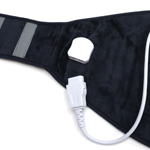 Le coussin chauffant pour bas du dos