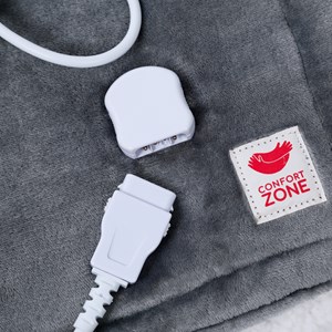 Le plaid chauffant électrique