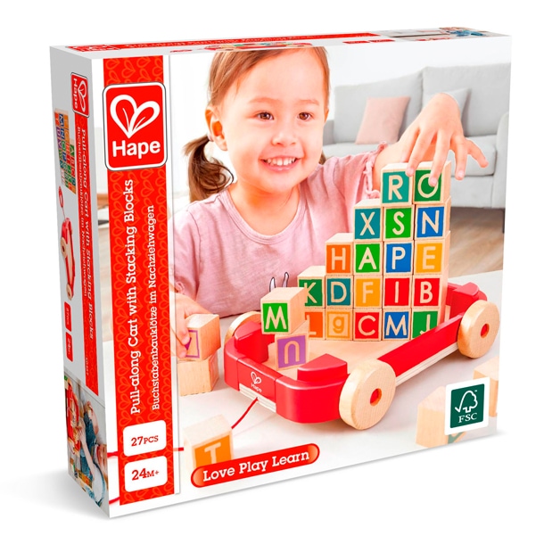 Jeune garçon, 2 ans, joue avec un puzzle ABC, alphabet Photo Stock