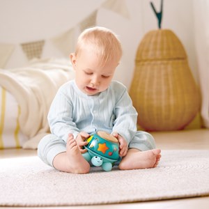 Boîte à musique tortue d'éveil lumineuse rotative Hape