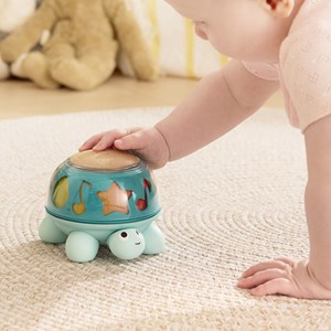 Boîte à musique tortue d'éveil lumineuse rotative Hape