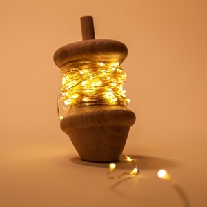 Toupie bois avec guirlande lumineuse