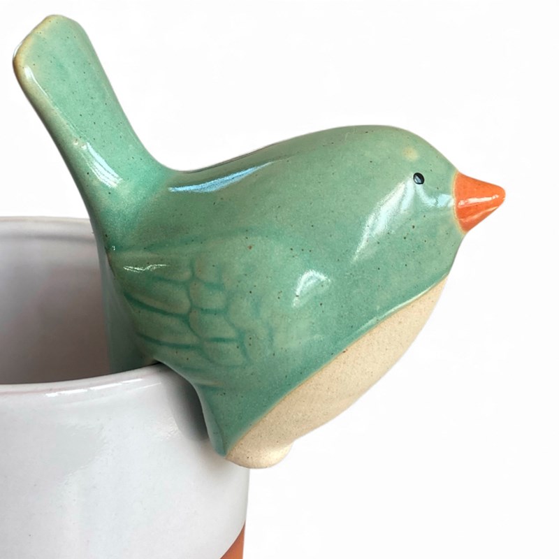 Décoration animal en céramique à accrocher sur un pot de fleurs