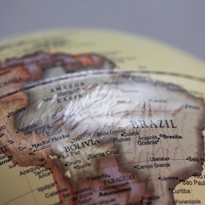 Globe sur pied bois antique