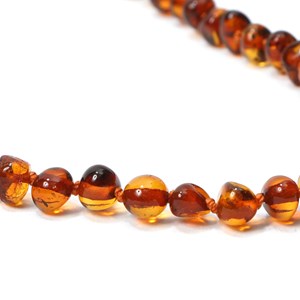 Collier perles d'ambre cognac