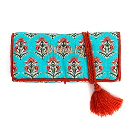Trousse à bijoux de voyage artisanale roulée et brodée en tissu