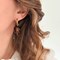 Boucles d'oreilles créoles en acier inoxydable et résine daphné ambré Ivoire