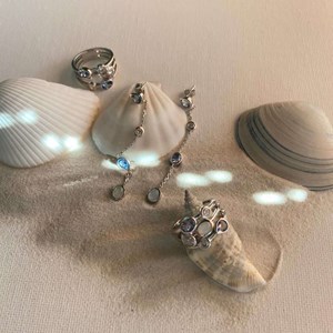 Boucles flore pendantes cristaux bleus argent 925 rhodié