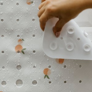 Tapis de douche - le pêche