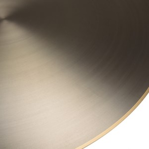James - table basse ronde 120x120cm en métal noir et bordure dorée