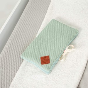 Housse matelas à langer nid d'abeille