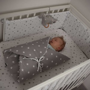 Peluche musicale tricot de coton dino