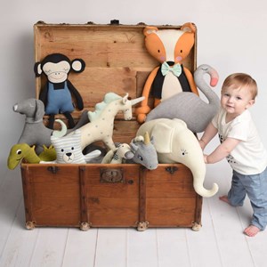 Peluche musicale tricot de coton dino