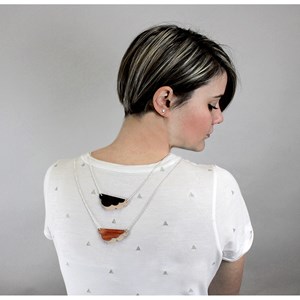 Pendentif en bois et métal