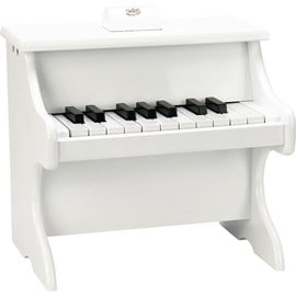 Piano blanc avec partitions