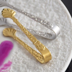 Pince à sucre dorée