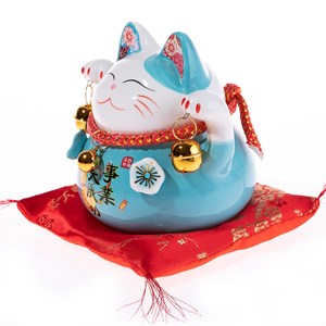 Maneki neko porte bonheur