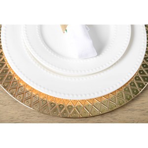 Dessous d'assiette à relief doré
