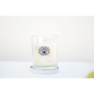 Bougie argent œil parfum patchouli