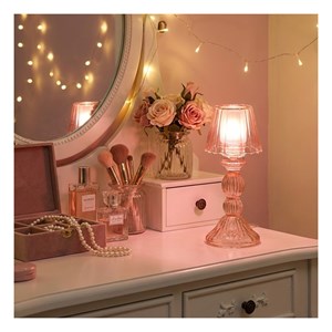 Bougeoir rose sur pied en verre