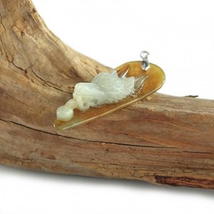 Pendentif tête de loup en jade