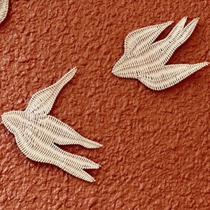 Set d'hirondelles en rotin