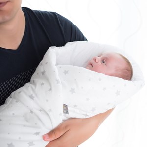 Gigoteuse d'emmaillotage réversible