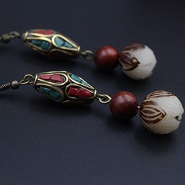 Boucles d'oreille ethniques en zinc