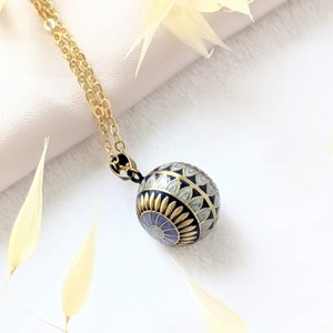 Bola de grossesse doré - megara