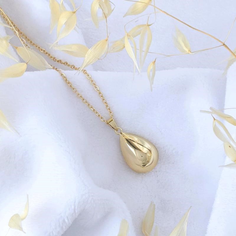 Bola de grossesse doré - goutte