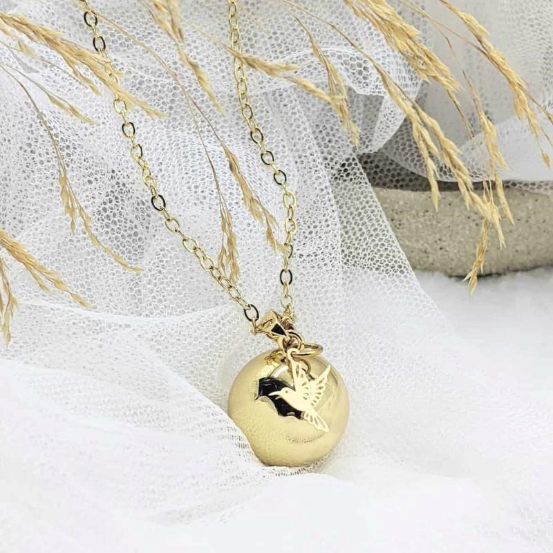 Bola de grossesse doré - colibri