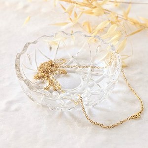 Bola de grossesse doré - colibri