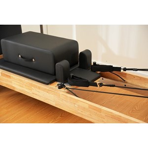 Pilates reformer en bois avec tour