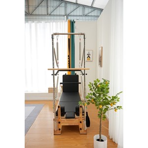 Pilates reformer en bois avec tour