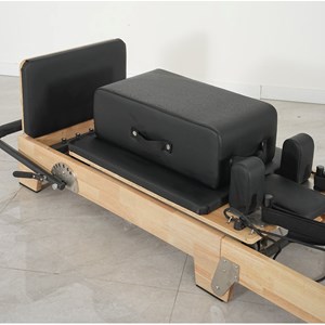 Pilates reformer pliable en bois 