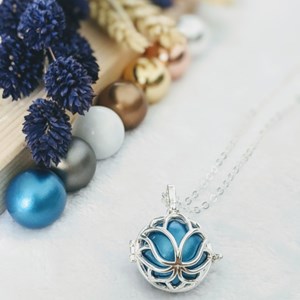 Bola cage - bille bleue - lotus