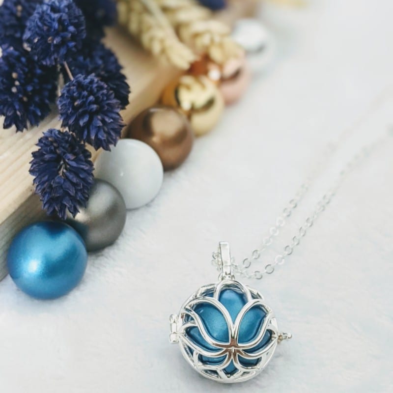 Bola cage - bille bleue - lotus