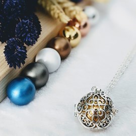 Bola cage - bille dorée - taïs