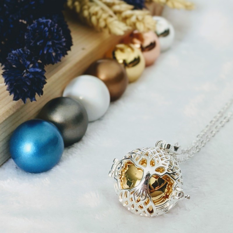 Bola cage - bille dorée - arbre