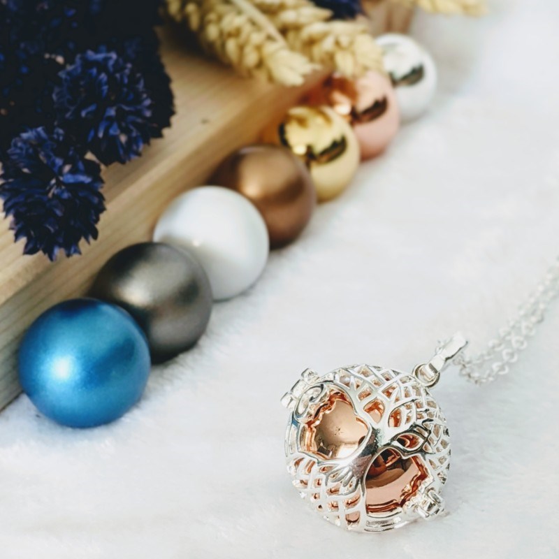 Bola cage - bille rose - arbre