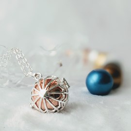 Bola cage - bille rose - flocon