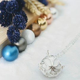 Bola cage - bille blanche - lotus