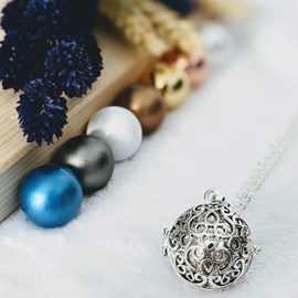 Bola cage - bille argentée - taïs