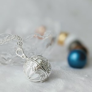 Bola cage - bille blanche - flocon