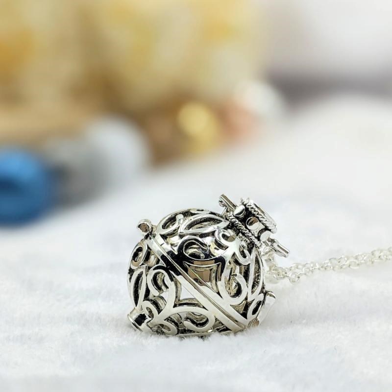 Loupita - Bola cage - bille argentée - céleste