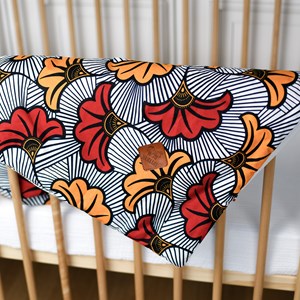 Couverture réversible wax fleurs rouge