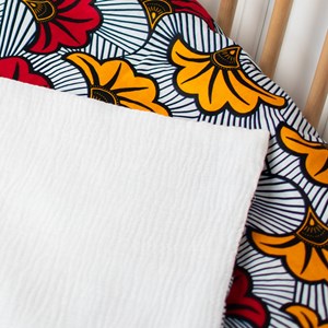 Couverture réversible wax fleurs rouge