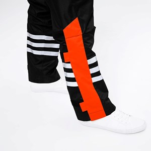 Pantalon de pluie optimiste noir-orange M-L